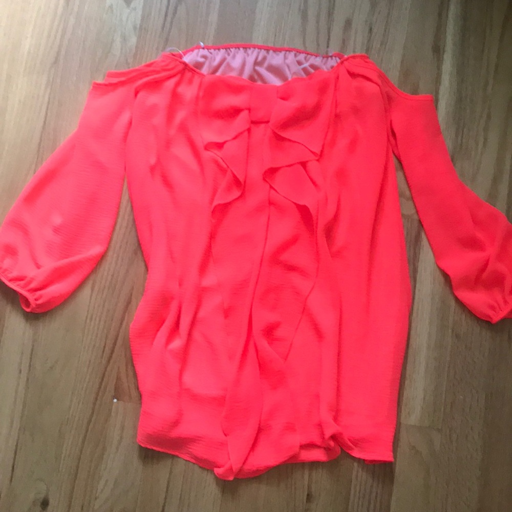 Neon pink strapless dress with sleeves